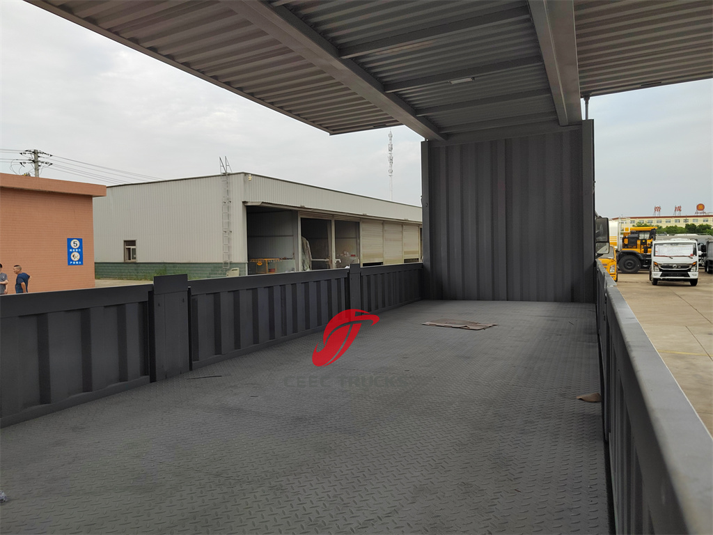 Isuzu wing van truck with with dropside cargo body