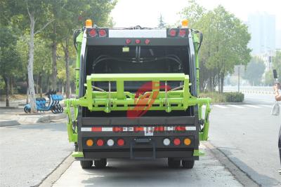 Trash compactor made by Isuzu trucks