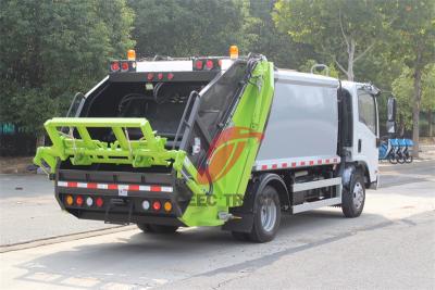 Trash compactor made by Isuzu trucks