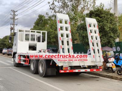 Isuzu giga Excavator Transport Stock Photos